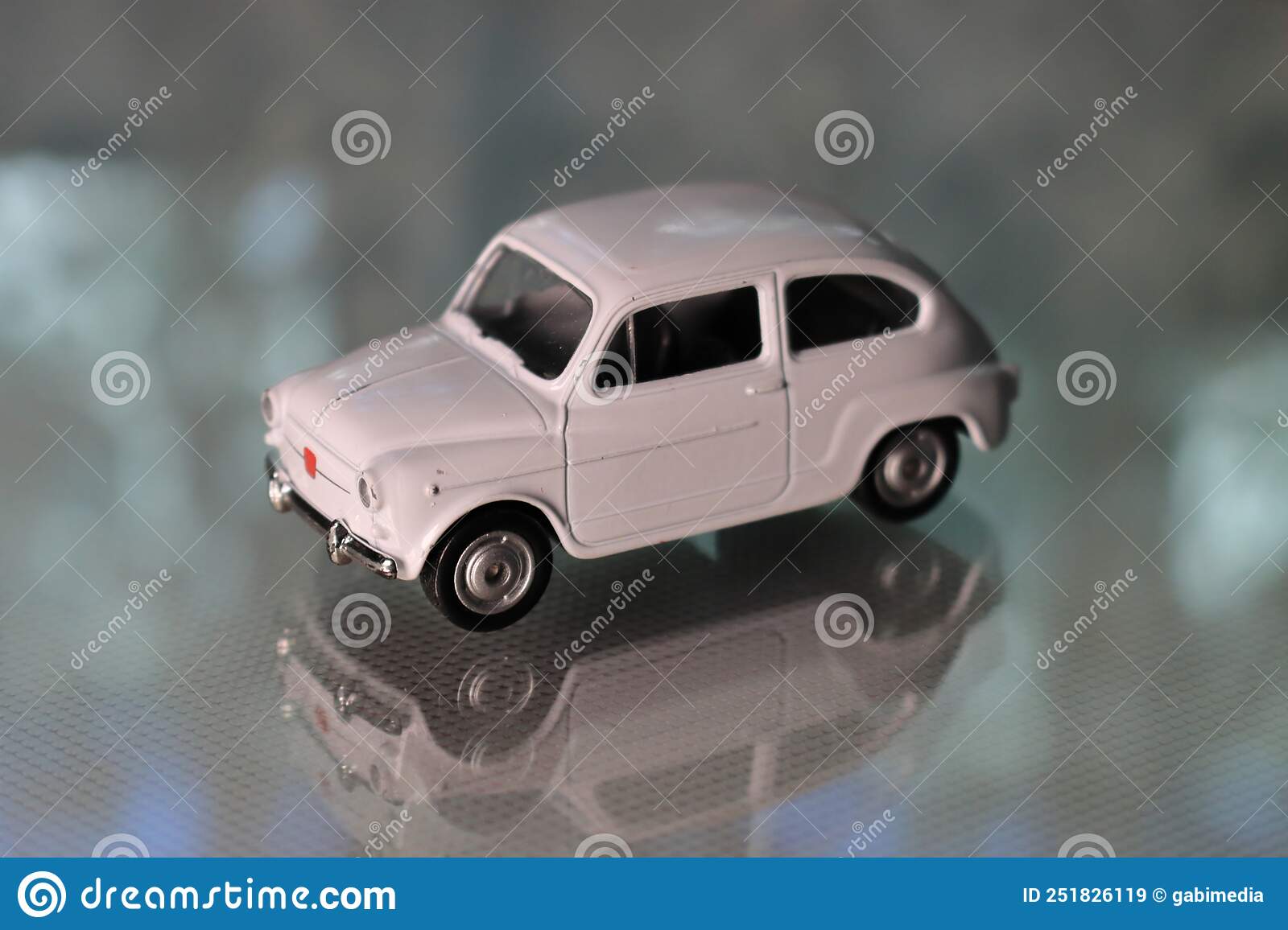 Fiat 500 White Diecast Model, Blurred Background